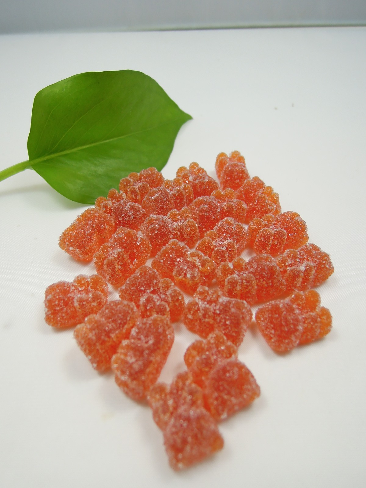 Orange berry-shaped gummies