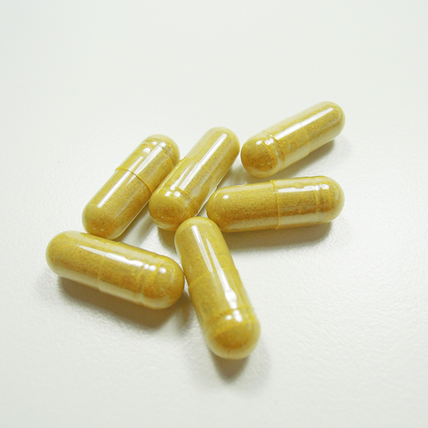 Hard capsules containing powdered ingredients